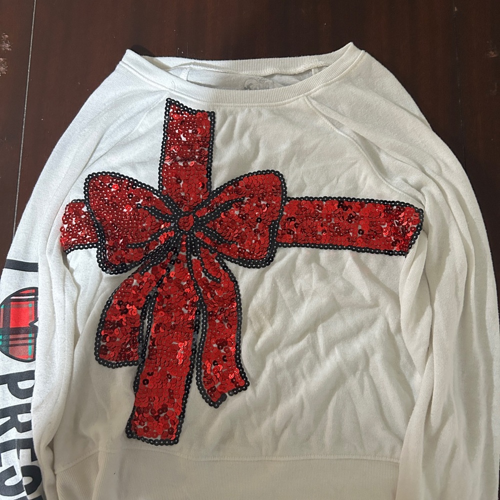 Justice White Sweater with Red Sequin Detail
